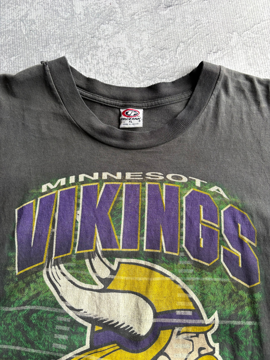Vintage 90s Minnesota Vikings Spellout Logo Faded Black Tee Shirt - XL